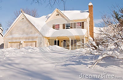 House covered in winter snow Stock Photo