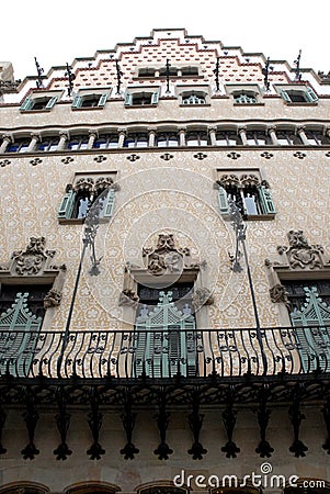 House designed by Gaudi with a long wrought iron balcony in Barcelona in Spain Editorial Stock Photo