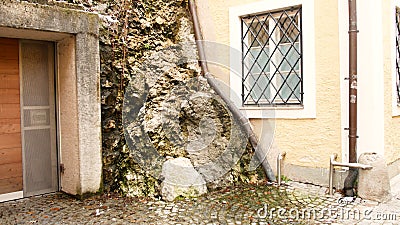 House detail near a rock face in Salzburg, winter time Stock Photo