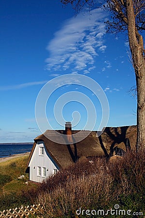 House in the dunes Stock Photo