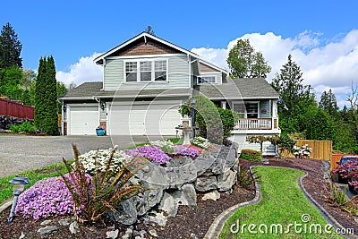 House exterior with curb appeal. View of porch and garage Stock Photo