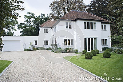 House Exterior With Driveway Stock Photo