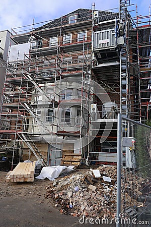 House facade with scaffolding, renovation and reconstruction of an old villa in Hamburg, Germany Stock Photo