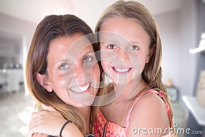 House family beauty mother and child daughter huging at home Stock Photo