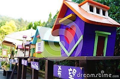 House full of hope, love, house with purple love, house made of wood Stock Photo