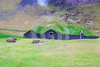 House with grass roof in heimaey, iceland. Green and eco house architecture. Ecology and environment concept. Eco Stock Photo