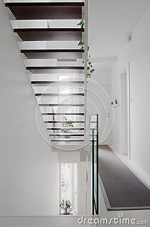 House hall stairs and glass balustrade Stock Photo