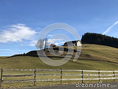 A house on the hill on the edge of the forest Stock Photo