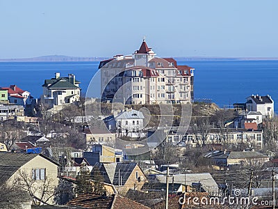 House on the hill near the sea Stock Photo