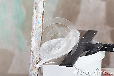 House improvement by worker puts finishing layer of stucco Stock Photo