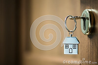 House key in a door Stock Photo