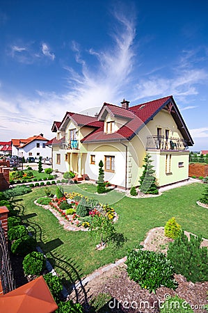 House with landscaped yard Stock Photo