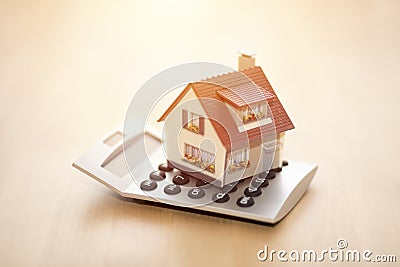 House miniature on calculator Stock Photo