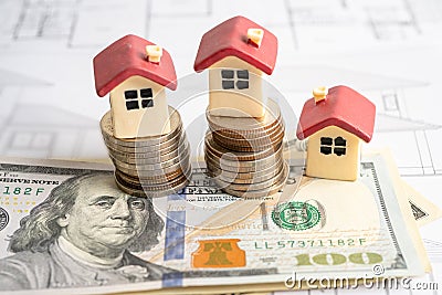 House model with stack of coin money, home loan, saving plan, installment payment finance and banking concept Stock Photo
