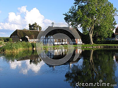 House near the pond in Danmark Stock Photo