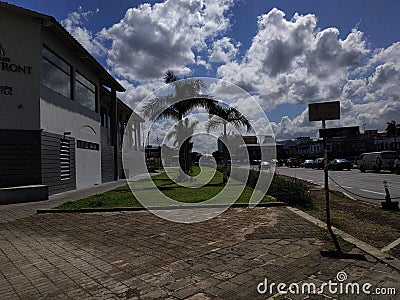 house neighbourhood town estate suburb city road architecture home street sky tree building downtown facade landmark Editorial Stock Photo