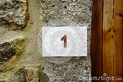 House Number 1 engraved in stone Stock Photo