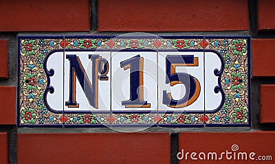 House number tile plaque with floral ornament Stock Photo