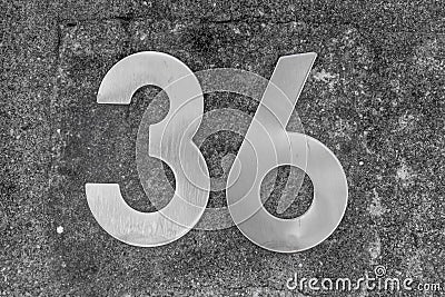 House number on the wall Stock Photo