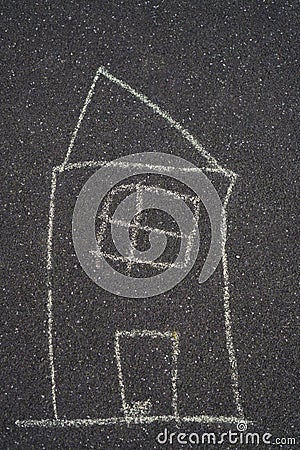A house painted by a child in chalk. A painted house is a symbol of a family buying or renting a house, vertical image Stock Photo