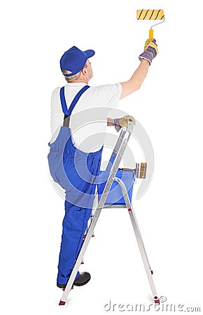 House painter on the ladder Stock Photo