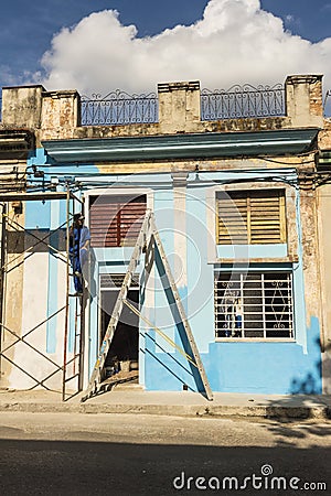 House painter taking a break Havana Editorial Stock Photo