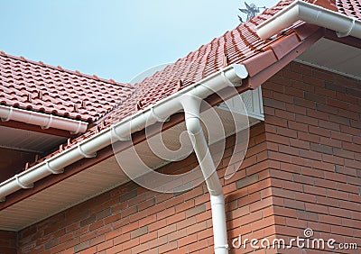 House Problem Areas for Rain Gutter Waterproofing. Guttering, Gutters, Plastic Guttering, Guttering, Drainage. Guttering Down pipe Stock Photo