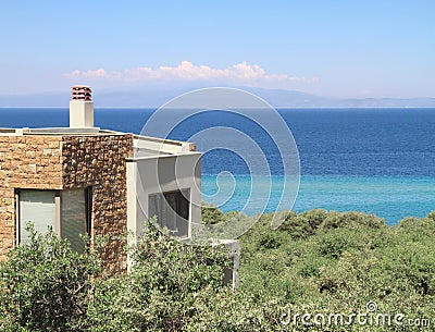 House by the sea , in olive groove Stock Photo