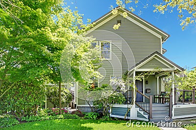 House spring grey exterior with entrance porch. Stock Photo