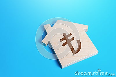 House with a turkish lira symbol. Search for options, choice of residential buildings. Property price valuation evaluation. Stock Photo