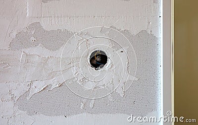 House under construction, euro power socket placed in a wall Stock Photo