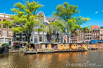 Houseboat on Amsterdam Canal Stock Photo