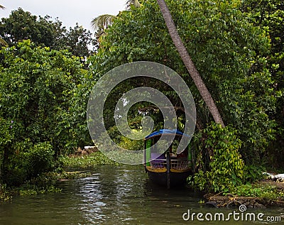 Houseboat on the banks of backwaters in Alleppey town of Kerala State in india Editorial Stock Photo