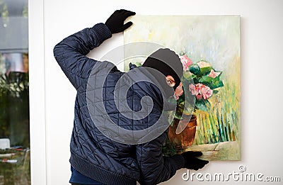 Stealing the work of art. Stock Photo