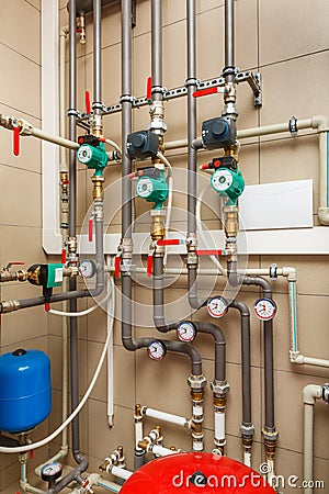 Household boiler house with heat pump, barrel; Valves; Sensors a Stock Photo