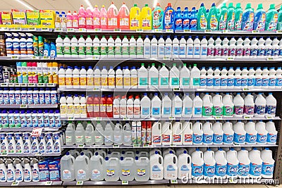 Household cleaning detergents, ammonia, bleach, alcohol. Full shelves in new store. Editorial Stock Photo