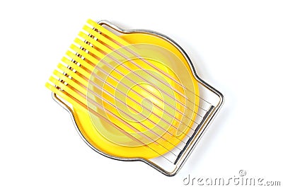 Household device for slicing eggs, close-up, white background, flat lay Stock Photo