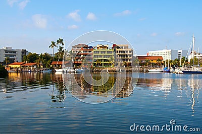 Houses on the bay with reflection in the water Stock Photo