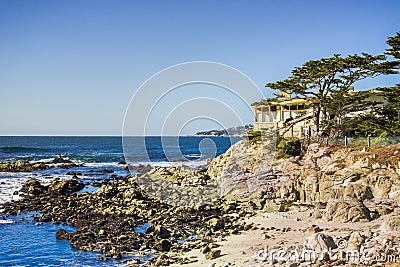 Houses build on the cliffs on the Pacific Ocean, Carmel-by-the-Sea, Monterey Peninsula, California Stock Photo