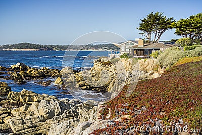 Houses build on the cliffs on the Pacific Ocean, Carmel-by-the-Sea, Monterey Peninsula, California Stock Photo