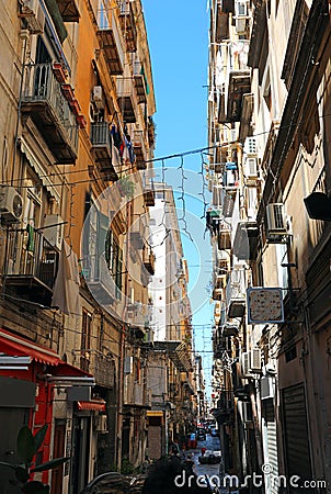 houses close to each other in the narrow alley of the Neapolitan neighborhood called the Spanish quarters Stock Photo