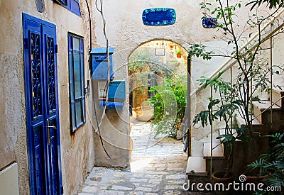 Courtyard house blue doors windows, Old Jaffa, Tel Aviv Stock Photo