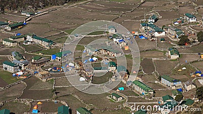 Houses and field in the Sherpa village Khumjung. Sad scene after the Earthquakes in spring 2015. Stock Photo