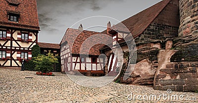 Houses in Imperial Castle Nuremberg in Germany, with vintage ins Stock Photo
