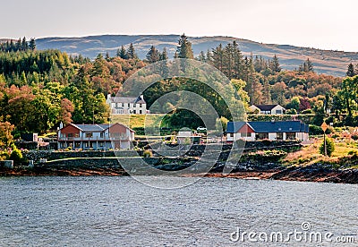 Houses by Loch Linnhe in Corran, a village situated on the Corran Narrows of Loch Linnhe, in the Scotland. Stock Photo