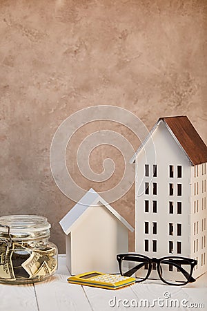 Houses models on white wooden table Stock Photo