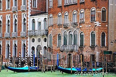 Houses with moored gondolas along Grand Canal in Venice, Italy Stock Photo