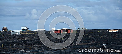 Houses near Kalapana lava flow Stock Photo