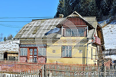Houses painted like easter eggs, in the village Ciocanesti, county Suceava, Romania Stock Photo