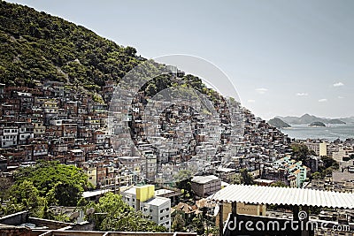 Houses stand on a hill in the Rocinha slum of Rio de Janeiro, Br Stock Photo